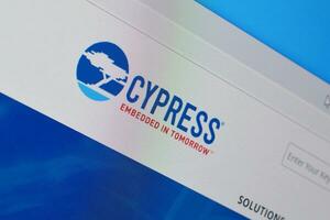 Homepage of cypress website on the display of PC, url - cypress.com. photo