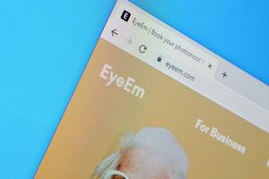 Homepage of eyeem website on the display of PC, url - eyeem.com. photo