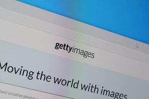 Homepage of gettyimages website on the display of PC, url - gettyimages.com. photo