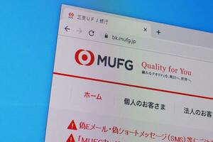 Homepage of mufg website on the display of PC, url - bk.mufg.jp. photo