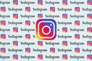 Instagram pattern printed on paper with small instagram logos and inscriptions. Instagram is American photo and video-sharing social networking service owned by Facebook