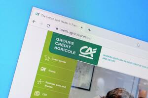 Homepage of credit-agricole website on the display of PC, url - credit-agricole.com. photo