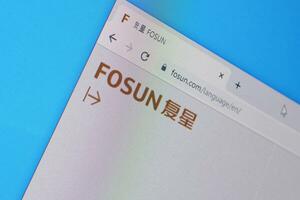 Homepage of fosun website on the display of PC, url - fosun.com. photo