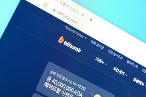 Homepage of bithumb website on the display of PC, url - bithumb.com. photo