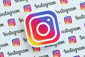 Instagram pattern printed on paper with small instagram logos and inscriptions. Instagram is American photo and video-sharing social networking service owned by Facebook