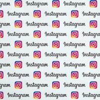 Instagram pattern printed on paper with small instagram logos and inscriptions. Instagram is American photo and video-sharing social networking service owned by Facebook