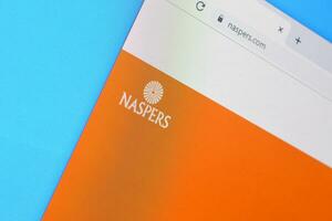 Homepage of naspers website on the display of PC, url - naspers.com. photo