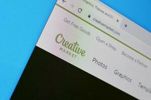 Homepage of creativemarket website on the display of PC, url - creativemarket.com. photo