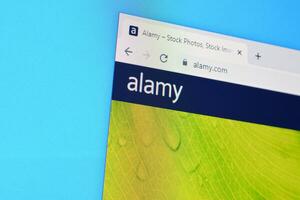 Homepage of alamy website on the display of PC, url - alamy.com. photo
