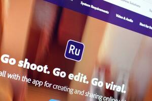 Web page of adobe premiere rush product on official website on the display of PC photo