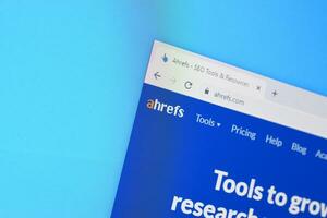 Homepage of ahrefs website on the display of PC, url - ahrefs.com. photo