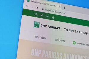 Homepage of bnp paribas website on the display of PC, url - group.bnpparibas. photo