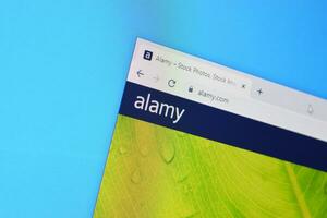 Homepage of alamy website on the display of PC, url - alamy.com. photo