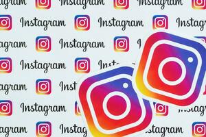 Instagram pattern printed on paper with small instagram logos and inscriptions. Instagram is American photo and video-sharing social networking service owned by Facebook