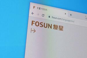 Homepage of fosun website on the display of PC, url - fosun.com. photo