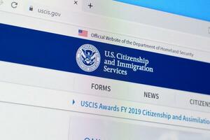 Homepage of uscis website on the display of PC, url - uscis.gov. photo