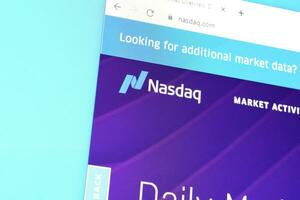 Homepage of nasdaq website on the display of PC, url - business.nasdaq.com. photo