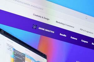 Web page of adobe analytics product on official website on the display of PC photo