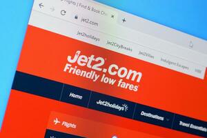 Homepage of jet2 website on the display of PC, url - jet2.com. photo