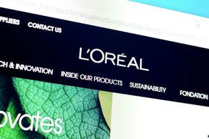 Homepage of loreal paris website on the display of PC, url - loreal.com. photo