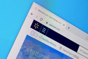 Homepage of walmart website on the display of PC, url - walmart.com. photo