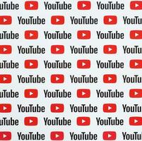 Youtube pattern printed on paper with small youtube logos and inscriptions. YouTube is Google subsidiary and American most popular video-sharing platform photo