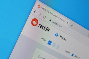 Homepage of reddit website on the display of PC, url - reddit.com. photo