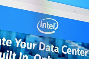 Homepage of intel website on the display of PC, url - intel.com. photo