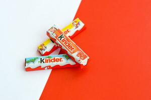 Kinder small Chocolate bars made by Ferrero SpA. Kinder is a confectionery product brand line of Italian multinational manufacturer Ferrero photo