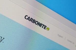 Homepage of carbonite website on the display of PC, url - carbonite.com. photo