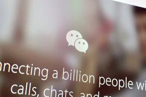 Homepage of wechat website on the display of PC, url - wechat.com. photo