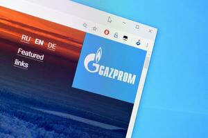 Homepage of gazprom website on the display of PC, url - gazprom.com. photo