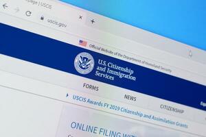 Homepage of uscis website on the display of PC, url - uscis.gov. photo