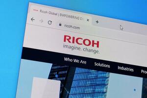 Homepage of ricoh website on the display of PC, url - ricoh.com. photo