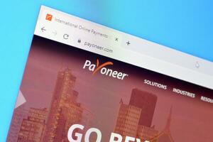 Homepage of payoneer website on the display of PC, url - payoneer.com. photo