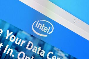 Homepage of intel website on the display of PC, url - intel.com. photo
