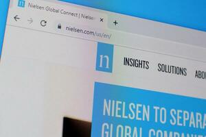 Homepage of nielsen website on the display of PC, url - nielsen.com. photo