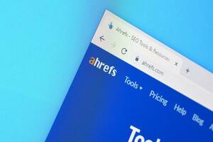 Homepage of ahrefs website on the display of PC, url - ahrefs.com. photo