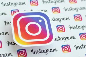 Instagram pattern printed on paper with small instagram logos and inscriptions. Instagram is American photo and video-sharing social networking service owned by Facebook