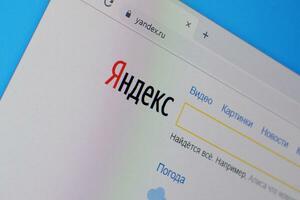 Homepage of yandex website on the display of PC, url - yandex.ru. photo