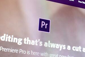 Web page of adobe premiere product on official website on the display of PC photo