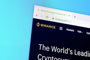 Homepage of binance website on the display of PC, url - binance.com. photo