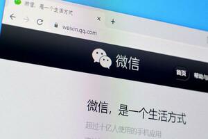 Homepage of weixin website on the display of PC, url - weixin.qq.com. photo