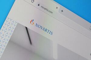 Homepage of novartis website on the display of PC, url - novartis.com. photo