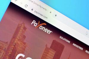 Homepage of payoneer website on the display of PC, url - payoneer.com. photo