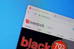 Homepage of overstock website on the display of PC, url - overstock.com. photo