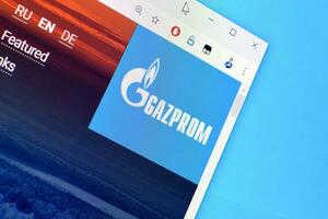 Homepage of gazprom website on the display of PC, url - gazprom.com. photo
