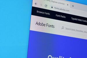 Web page of adobe fonts product on official website on the display of PC photo