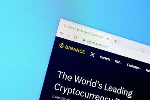 Homepage of binance website on the display of PC, url - binance.com. photo