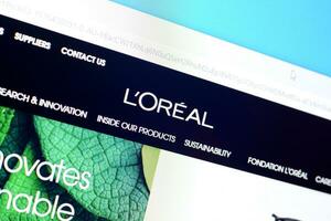 Homepage of loreal paris website on the display of PC, url - loreal.com. photo